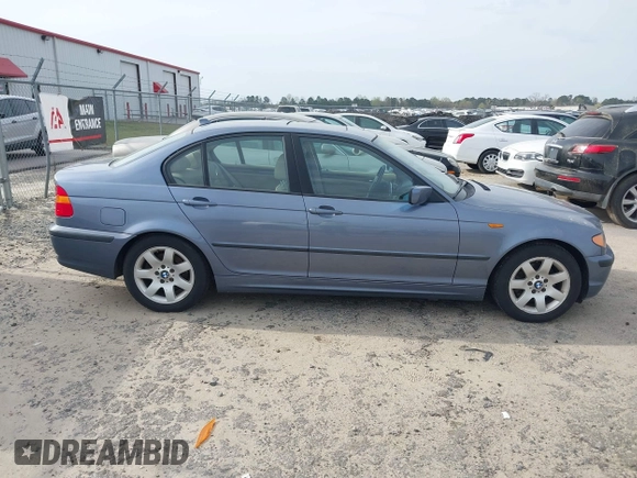 2005 BMW 3 Series 325i with VIN WBAET37445NJ85538, listed as a IAAI auction lot 41872686 with 121,237 mi miles. Bid and sale history available at carsss.com. Image 13.