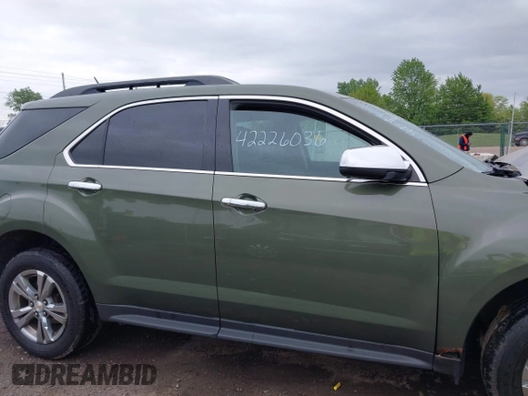 2015 Chevrolet Equinox LT z VIN 2GNALBEK5F6234840, wystawiony jako IAAI lot #42226036 z przebiegiem 92 669 mil mil oraz . Historia ofert i sprzedaży dostępna na DreamBid. Obrazek 13.