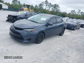 2019 Toyota Corolla L z VIN 5YFBURHE1KP947817, wystawiony jako IAAI lot #41959566 z przebiegiem 128 574 mil mil oraz . Historia ofert i sprzedaży dostępna na DreamBid. Obrazek 18.