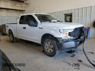 2018 Ford F-150 XL with VIN 1FTFX1E56JFC69571, listed as a Copart auction lot 45755715 with 156,830 mi miles and Salvage title. Bid and sale history available at DreamBid. Image 4.