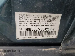 1997 Honda Civic LX with VIN 1HGEJ6574VL020352, listed as a Copart auction lot 53406855 with 216,655 mi miles and Clean Title. Bid and sale history available at carsss.com. Image 13.