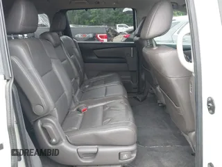 2012 Honda Odyssey Touring with VIN 5FNRL5H93CB034485, listed as a IAAI auction lot 42304502 with 198,589 mi miles and . Bid and sale history available at DreamBid. Image 8.