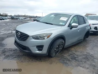 2016 Mazda CX-5 Grand Touring with VIN JM3KE4DY0G0816466, listed as a IAAI auction lot 41720059 with NaN miles. Bid and sale history available at carsss.com. Image 17.