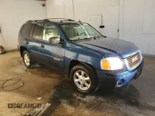 2005 GMC Envoy SLT with VIN 1GKDS13S652339845, listed as a Copart auction lot 77693684 with 220,306 mi miles and Salvage Title. Bid and sale history available at carsss.com. Image 4.
