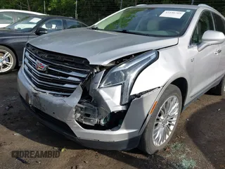 2017 Cadillac XT5 Luxury FWD z VIN 1GYKNBRS8HZ265955, wystawiony jako IAAI lot #42198769 z przebiegiem 125 086 mil mil oraz . Historia ofert i sprzedaży dostępna na DreamBid. Obrazek 6.