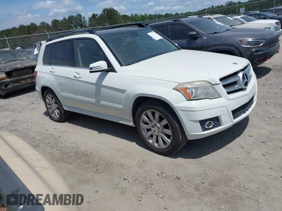 2012 Mercedes-Benz GLK with VIN WDCGG5GB4CF877097, listed as a IAAI auction lot 42127733 with Not Provided miles. Bid and sale history available at carsss.com. Image 1.