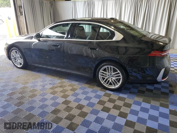 2024 BMW 5 Series 530i xDrive with VIN WBA53FJ01RCS03809, listed as a Copart auction lot 76772264 with 8,403 mi miles and Clean Title. Bid and sale history available at carsss.com. Image 2.