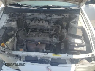 1999 Nissan Sentra XE with VIN 1N4AB41D2XC700091, listed as a Copart auction lot 59734435 with 53,658 mi miles and Salvage title. Bid and sale history available at DreamBid. Image 11.