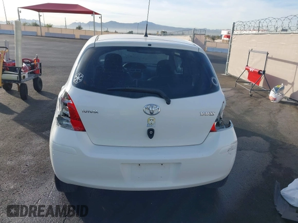 2009 Toyota Yaris with VIN JTDKT903795263620, listed as a IAAI auction lot 41100398 with 66,384 mi miles. Bid and sale history available at carsss.com. Image 12.