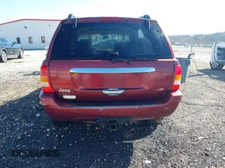 1999 Jeep Grand Cherokee Limited with VIN 1J4GW68N3XC770468, listed as a IAAI auction lot 41793600 with 65,277 mi miles. Bid and sale history available at carsss.com. Image 16.