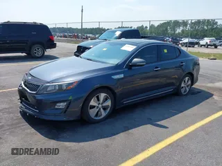 2015 Kia Optima EX z VIN KNAGN4AD8F5084764, wystawiony jako IAAI lot #42404405 z przebiegiem 158 587 mil mil oraz . Historia ofert i sprzedaży dostępna na DreamBid. Obrazek 2.