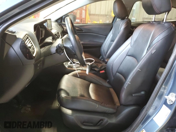 2015 Mazda 3 i Grand Touring z VIN 3MZBM1W75FM220907, wystawiony jako Copart lot #58464185 z przebiegiem 144 435 mil mil oraz Szkoda całkowita • Salvage title. Historia ofert i sprzedaży dostępna na DreamBid. Obrazek 7.