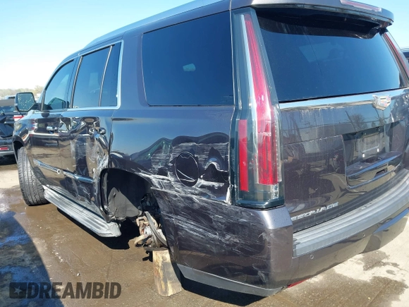 2015 Cadillac Escalade Luxury z VIN 1GYS3MKJ2FR518865, wystawiony jako IAAI lot #41890235 z przebiegiem 156 849 mil mil oraz . Historia ofert i sprzedaży dostępna na DreamBid. Obrazek 6.