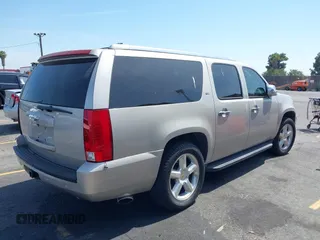 2007 Chevrolet Suburban LT with VIN 3GNFC16017G185557, listed as a IAAI auction lot 42487931 with 103,775 mi miles and . Bid and sale history available at DreamBid. Image 4.