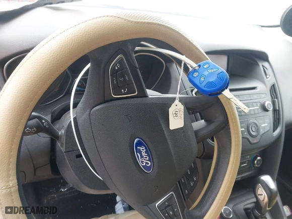 2016 Ford Focus SE with VIN 1FADP3F23GL316269, listed as a IAAI auction lot 41634634 with 71,617 mi miles. Bid and sale history available at carsss.com. Image 11.