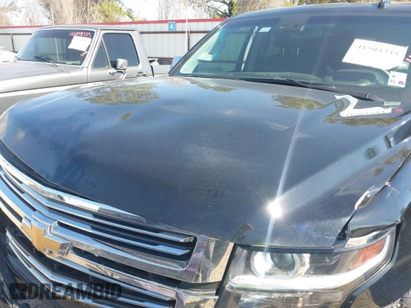 2019 Chevrolet Suburban LT with VIN 1GNSCJKC5KR360318, listed as a IAAI auction lot 41504344 with 82,997 mi miles and . Bid and sale history available at DreamBid. Image 10.