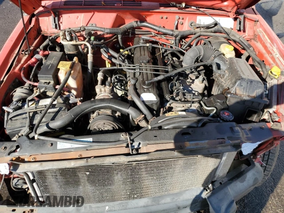 1999 Jeep Cherokee SE with VIN 1J4FT28S6XL515896, listed as a Copart auction lot 83745444 with 192,406 mi miles and Salvage title. Bid and sale history available at DreamBid. Image 12.