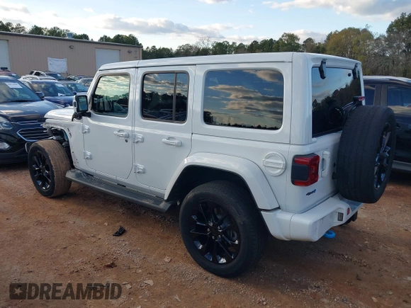 2021 Jeep Wrangler Unlimited Sahara with VIN 1C4JJXP64MW840094, listed as a IAAI auction lot 40830676 with 31,716 mi miles and . Bid and sale history available at DreamBid. Image 3.