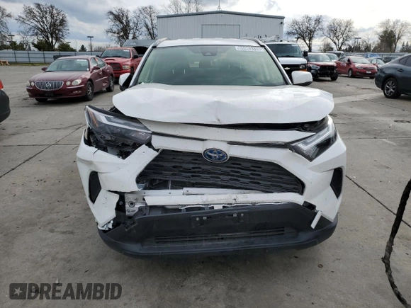 2023 Toyota RAV4 Hybrid LE with VIN JTMMWRFV3PD570648, listed as a Copart auction lot 86983174 with 27,258 mi miles and Salvage title. Bid and sale history available at DreamBid. Image 5.
