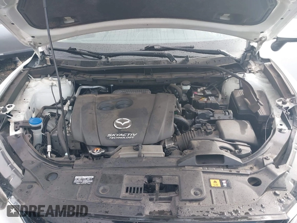 2015 Mazda CX-5 Grand Touring with VIN JM3KE4DY0F0483037, listed as a IAAI auction lot 41578222 with 102,988 mi miles. Bid and sale history available at carsss.com. Image 10.