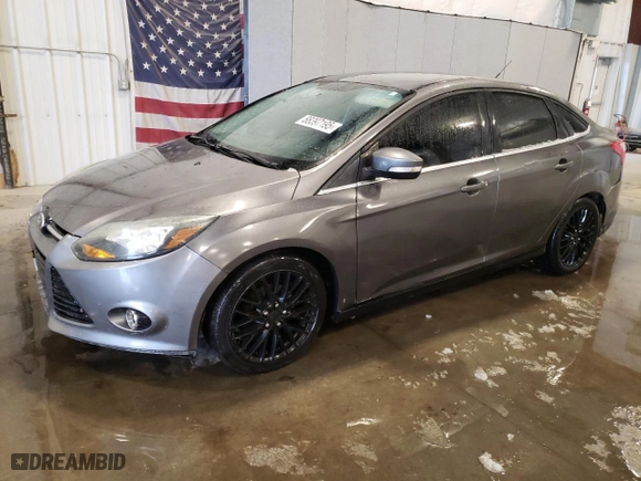 2014 Ford Focus Titanium with VIN 1FADP3J2XEL441483, listed as a Copart auction lot 88397195 with 54,813 mi miles and Salvage Title. Bid and sale history available at carsss.com. Image 1.