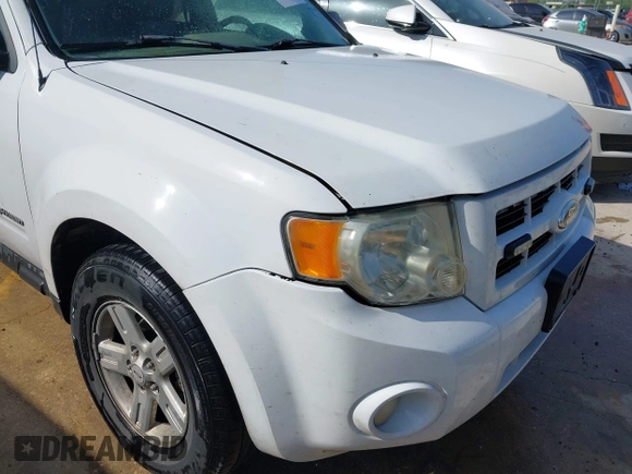 2011 Ford Escape Hybrid with VIN 1FMCU4K3XBKA75758, listed as a IAAI auction lot 42753145 with 170,554 mi miles and . Bid and sale history available at DreamBid. Image 12.