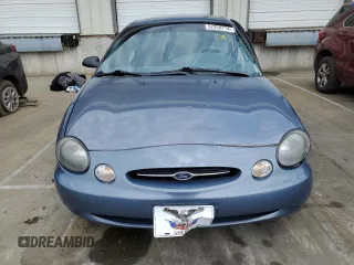 1999 Ford Taurus LX z VIN 1FAFP52UXXA159704, wystawiony jako Copart lot #52350774 z przebiegiem 112 562 mil mil oraz Szkody całkowita. Historia ofert i sprzedaży dostępna na DreamBid. Obrazek 5.