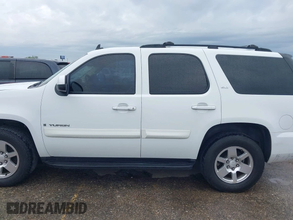 2009 GMC Yukon SLT w/4SA with VIN 1GKFK33049R153415, listed as a IAAI auction lot 41896770 with 182,256 mi miles. Bid and sale history available at carsss.com. Image 14.