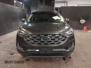 2020 Ford Edge SEL z VIN 2FMPK4J93LBA55165, wystawiony jako IAAI lot #42346860 z przebiegiem 72 201 mil mil oraz . Historia ofert i sprzedaży dostępna na DreamBid. Obrazek 12.
