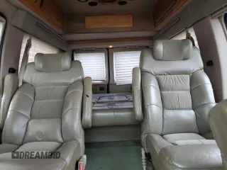 2001 Ford Econoline Cargo Recreational with VIN 1FDPE24L51HB59174, listed as a Copart auction lot 84857404 with 129,690 mi miles and Salvage Title. Bid and sale history available at DreamBid. Image 10.