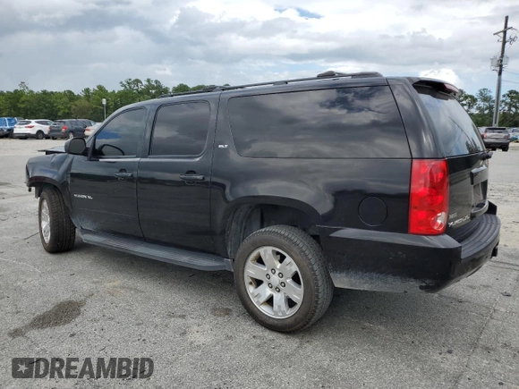 2011 GMC Yukon XL SLT with VIN 1GKS1KE09BR232187, listed as a Copart auction lot 69174634 with Not Provided miles and Salvage Title. Bid and sale history available at carsss.com. Image 2.