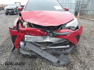 2021 Toyota C-HR LE with VIN JTNKHMBX1M1104530, listed as a IAAI auction lot 41324350 with 53,112 mi miles. Bid and sale history available at carsss.com. Image 6.