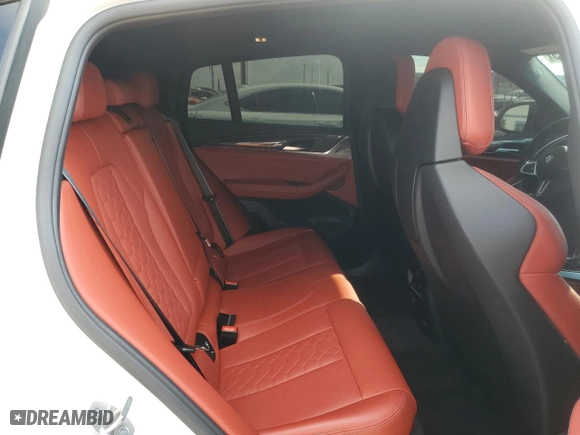 2022 BMW X4 M with VIN 5YM23EC01N9J82231, listed as a Copart auction lot 43271695 with 20715 miles and Salvage Title. Bid and sale history available at carsss.com. Image 11.