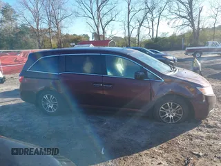 2012 Honda Odyssey EX-L with VIN 5FNRL5H60CB096691, listed as a IAAI auction lot 41824395 with 93,047 mi miles and . Bid and sale history available at DreamBid. Image 13.