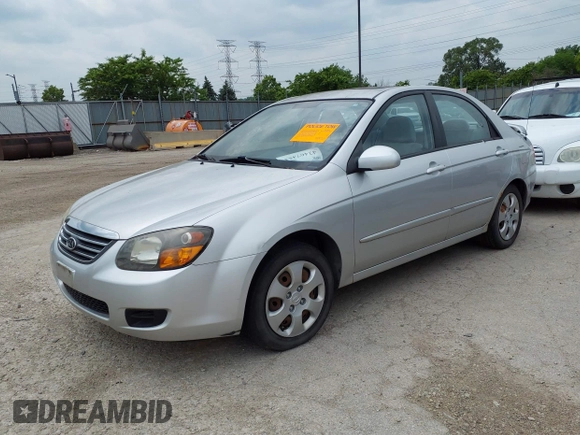 2009 Kia Spectra EX with VIN KNAFE221995613874, listed as a IAAI auction lot 42467453 with 104,158 mi miles and . Bid and sale history available at DreamBid. Image 2.