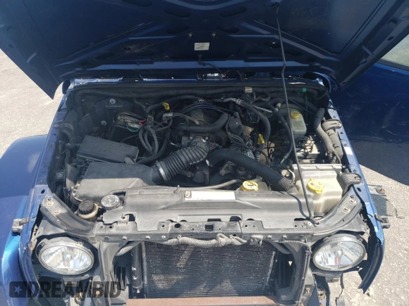 2009 Jeep Wrangler Sahara with VIN 1J4FA54199L747528, listed as a Copart auction lot 80974584 with 226,299 mi miles and Salvage title. Bid and sale history available at DreamBid. Image 12.