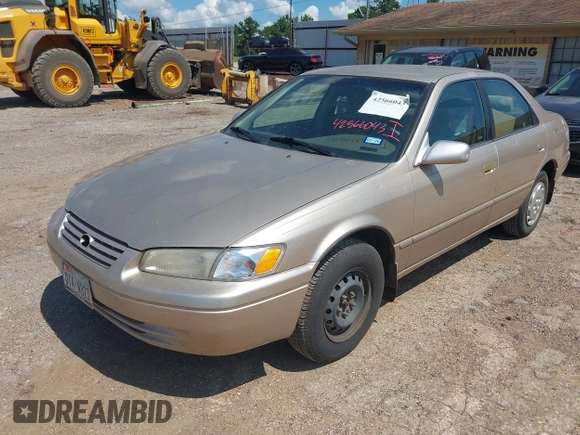 1997 Toyota Camry LE with VIN JT2BG22K4V0084080, listed as a IAAI auction lot 42566043 with 167,774 mi miles and . Bid and sale history available at DreamBid. Image 2.