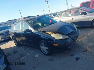 2003 Ford Focus SE z VIN 1FAFP34Z13W329961, wystawiony jako IAAI lot #41341137 z przebiegiem 176 609 mil mil oraz . Historia ofert i sprzedaży dostępna na DreamBid. Obrazek 1.