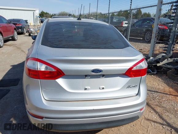 2016 Ford Fiesta S z VIN 3FADP4AJ2GM138776, wystawiony jako IAAI lot #41879870 z przebiegiem 83 769 mil mil oraz . Historia ofert i sprzedaży dostępna na DreamBid. Obrazek 16.