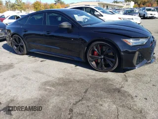 2021 Audi RS 7 z VIN WUAPCBF2XMN902368, wystawiony jako Copart lot #73284763 z przebiegiem 37 625 mil mil oraz . Historia ofert i sprzedaży dostępna na DreamBid. Obrazek 4.