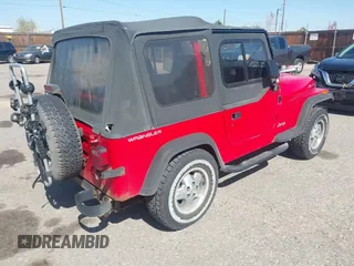 1995 Jeep Wrangler S with VIN 1J4FY19P5SP286845, listed as a IAAI auction lot 42028886 with 155,841 mi miles. Bid and sale history available at carsss.com. Image 4.