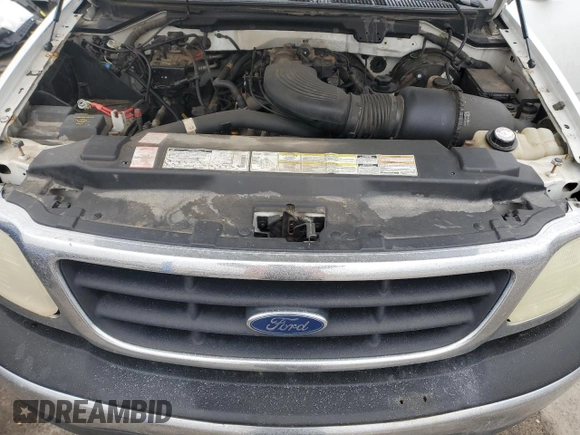 2000 Ford F-150 with VIN 1FTRF18W8YKA60791, listed as a Copart auction lot 45215895 with 157,885 mi miles and Clean title. Bid and sale history available at DreamBid. Image 11.