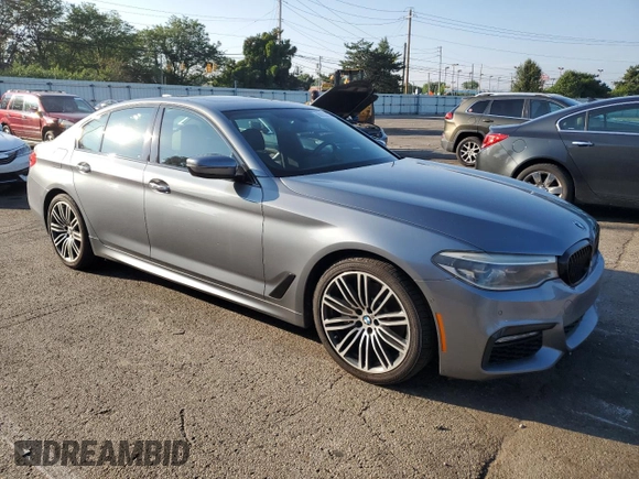 2017 BMW 5 Series 530i xDrive with VIN WBAJA7C38HG906137, listed as a Copart auction lot 66202255 with 154,480 mi miles and Clean title. Bid and sale history available at DreamBid. Image 4.