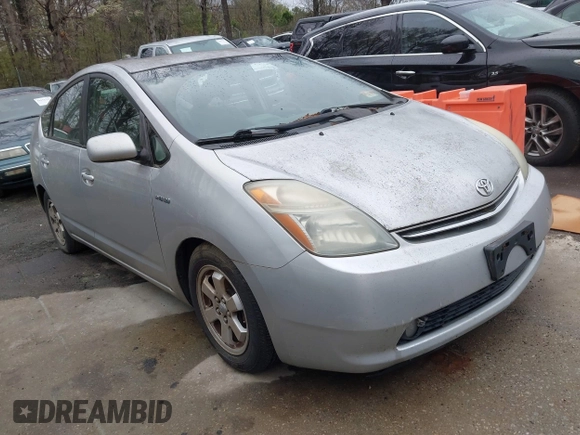 2006 Toyota Prius with VIN JTDKB20U467073003, listed as a IAAI auction lot 41852366 with 164,107 mi miles and . Bid and sale history available at DreamBid. Image 1.