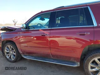 2016 Chevrolet Tahoe LTZ z VIN 1GNSKCKC9GR205745, wystawiony jako IAAI lot #41710241 z przebiegiem 94 931 mil mil oraz . Historia ofert i sprzedaży dostępna na DreamBid. Obrazek 14.