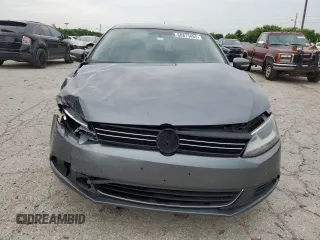 2014 Volkswagen Jetta SE with VIN 3VWD07AJ7EM363186, listed as a Copart auction lot 60873465 with 215,323 mi miles and Salvage title. Bid and sale history available at DreamBid. Image 5.