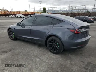 2023 Tesla Model 3 с VIN 5YJ3E1EA4PF409796, выставлен на аукционе Copart как лот 54202465 с пробегом 45 275 миль миль и Списание • Salvage title. История ставок и продаж доступна на DreamBid. Изображение 2.