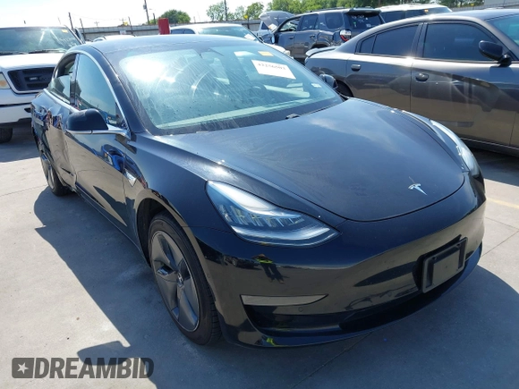 2020 Tesla Model 3 Standard Range Plus z VIN 5YJ3E1EA3LF611152, wystawiony jako IAAI lot #42256503 z przebiegiem 78 633 mil mil oraz . Historia ofert i sprzedaży dostępna na DreamBid. Obrazek 1.