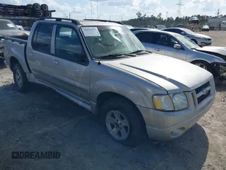 2005 Ford Explorer Sport Trac XLS z VIN 1FMZU67K15UA98747, wystawiony jako IAAI lot #42014293 z przebiegiem 231 902 mil mil oraz . Historia ofert i sprzedaży dostępna na DreamBid. Obrazek 1.