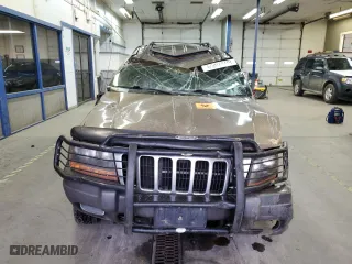 2001 Jeep Grand Cherokee Laredo with VIN 1J4GW48N01C529690, listed as a Copart auction lot 82037774 with 142,673 mi miles and Salvage Title. Bid and sale history available at carsss.com. Image 5.